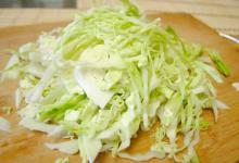 Cabbage salad with egg and cheese